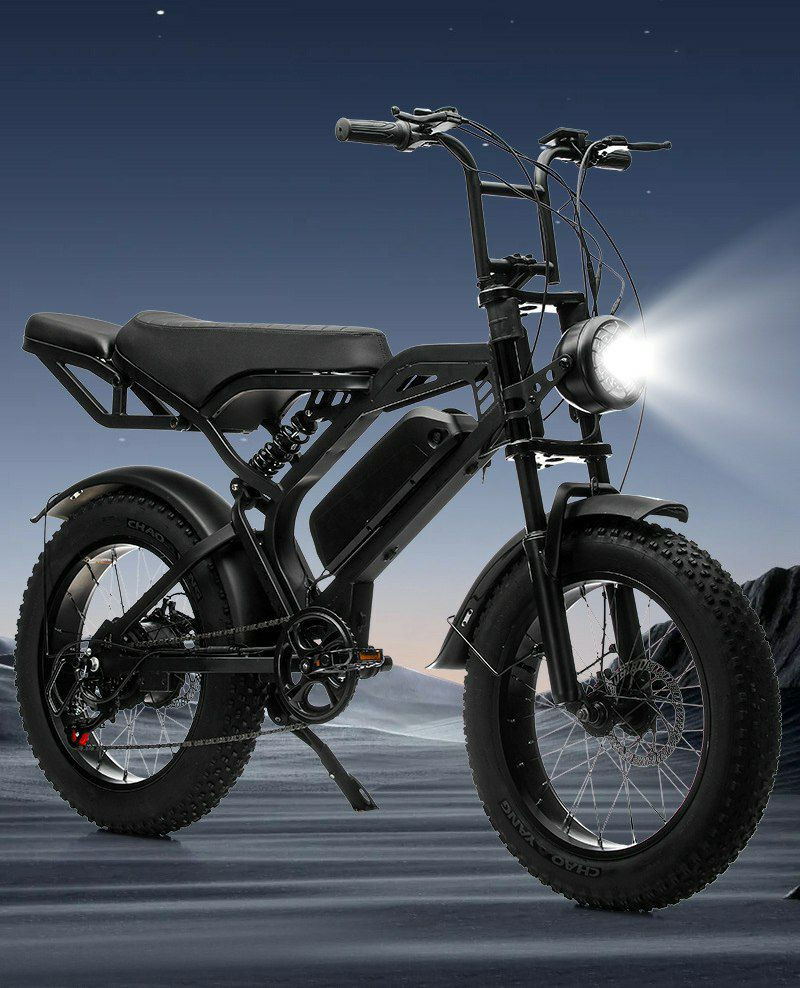 Vélo de montagne électrique, spécifiquement le modèle Frike, avec un cadre en acier à haute teneur en carbone.