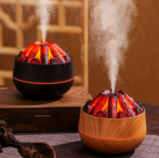 Humidificateur d'air et diffuseur d'arômes au design imitant un feu de charbon de bois.
